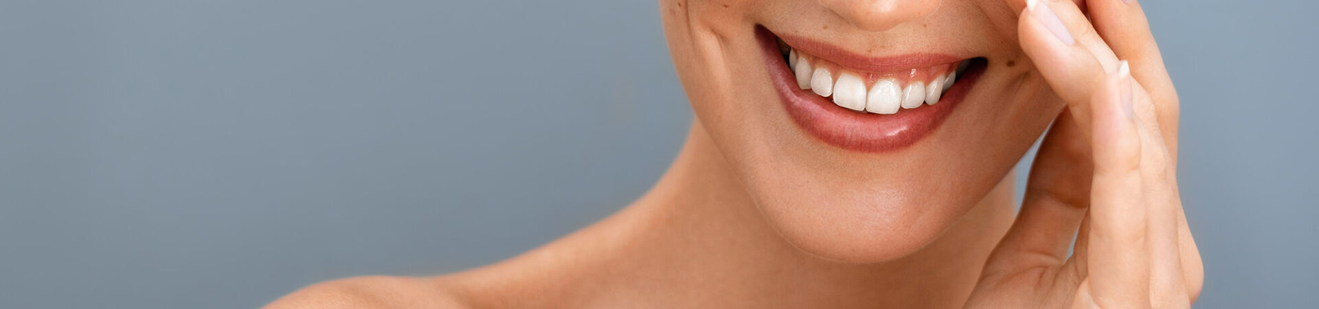 close up of smiling female with white teeth